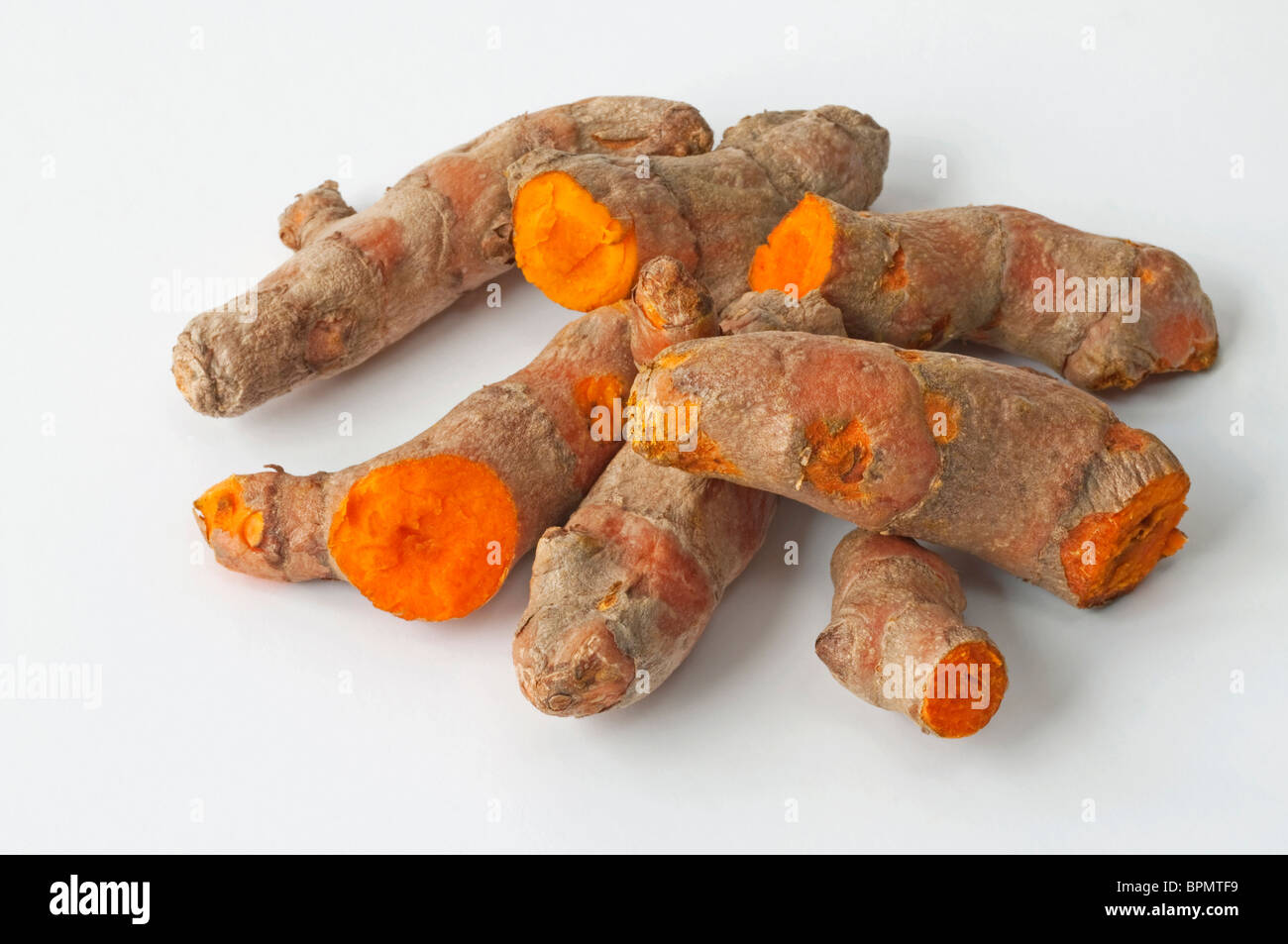 Turmeric (Curcuma longa, Curcuma domestica), cut roots, studio picture