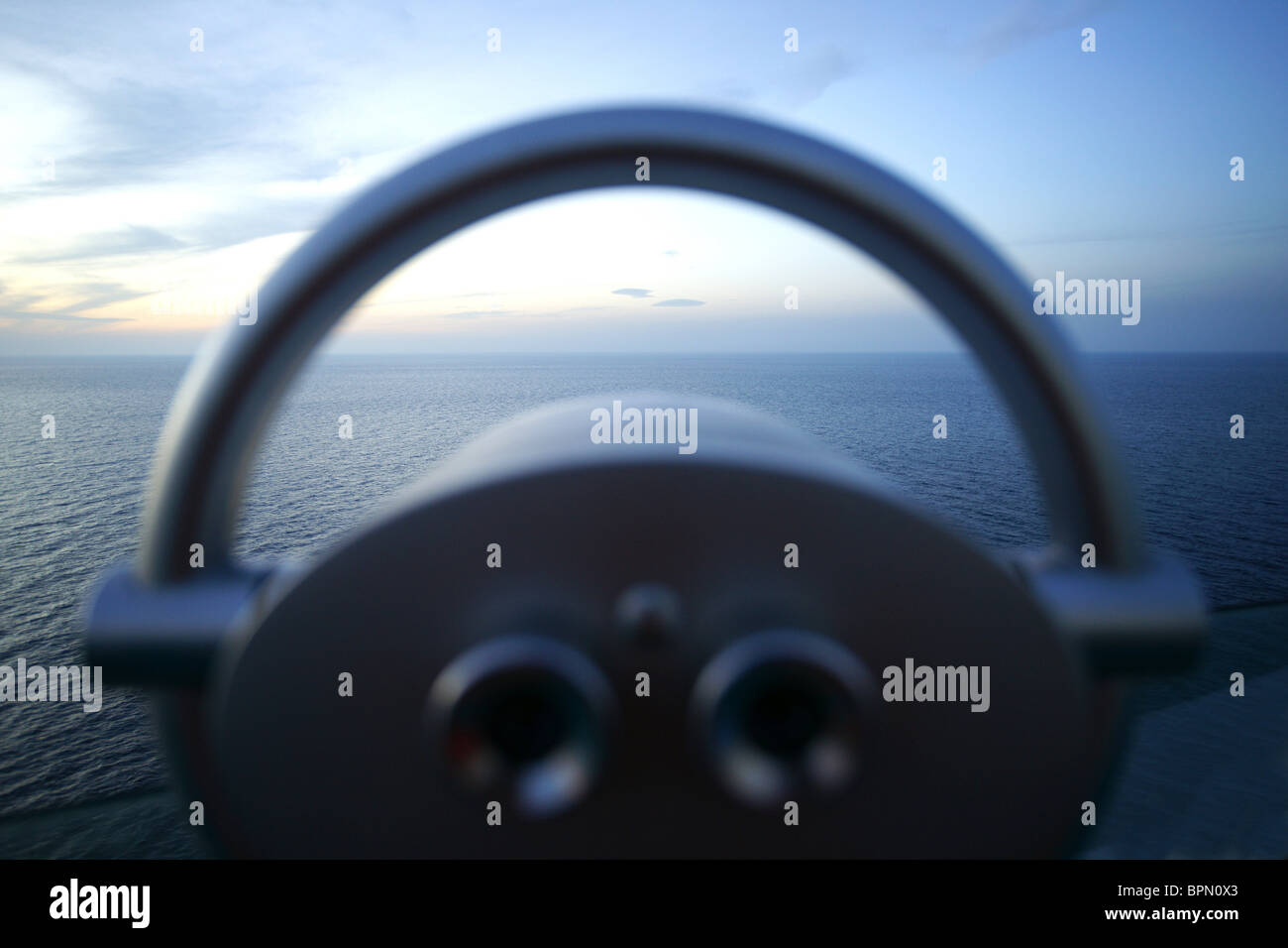 Binoculars on a cruise ship at dusk, Mediterranean Sea Stock Photo - Alamy