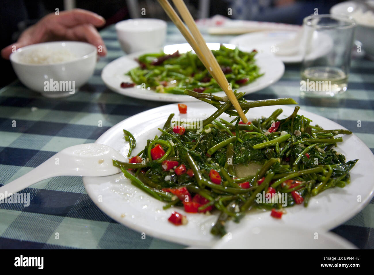 Water spinach, traditional chinese dish in a restaurant at Dali, Yunnan, People's Republic of China, Asia Stock Photo