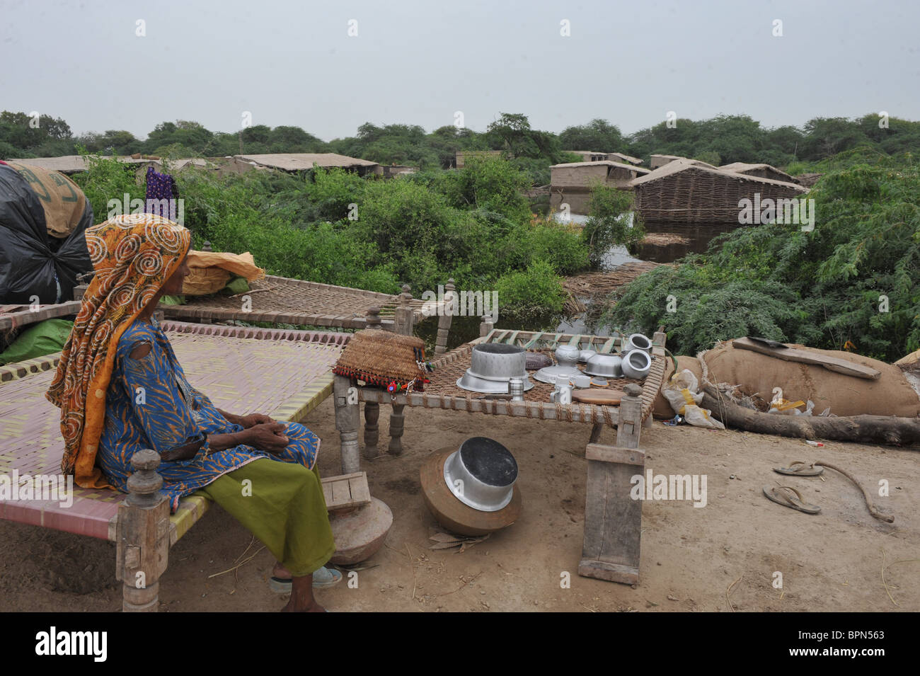 Flood victims living on the only dry areas in Sujawal, Sindh Province ...