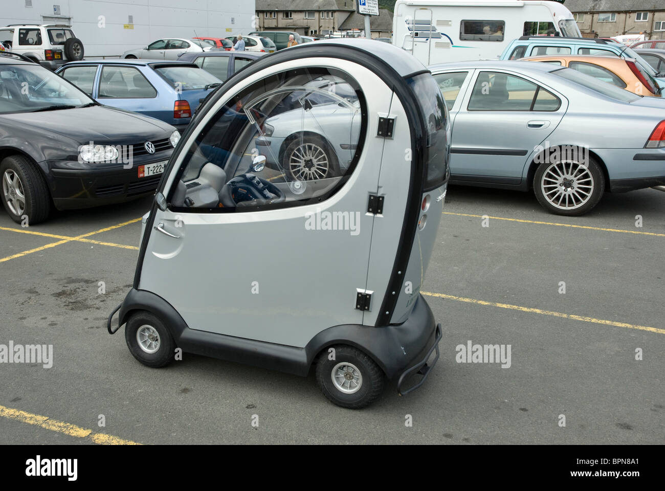 Shopper disabled electric vehicle parked in car park Stock Photo Alamy