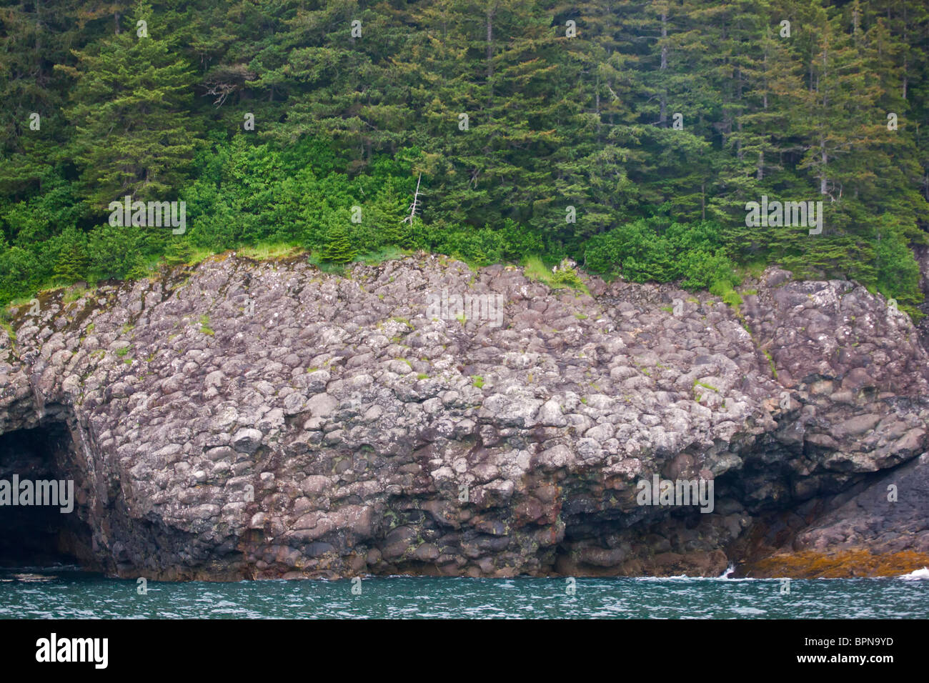 Pillow basalt rock, Resurrection Bay coast, near Seward, Alaska. Stock Photo