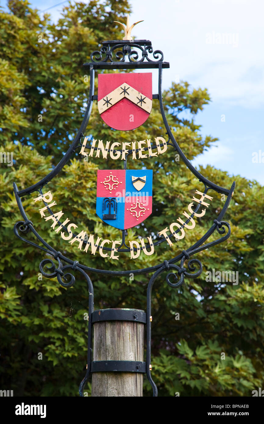 Village sign, Lingfield, Surrey, UK. Twinned with Plaisance du Touch