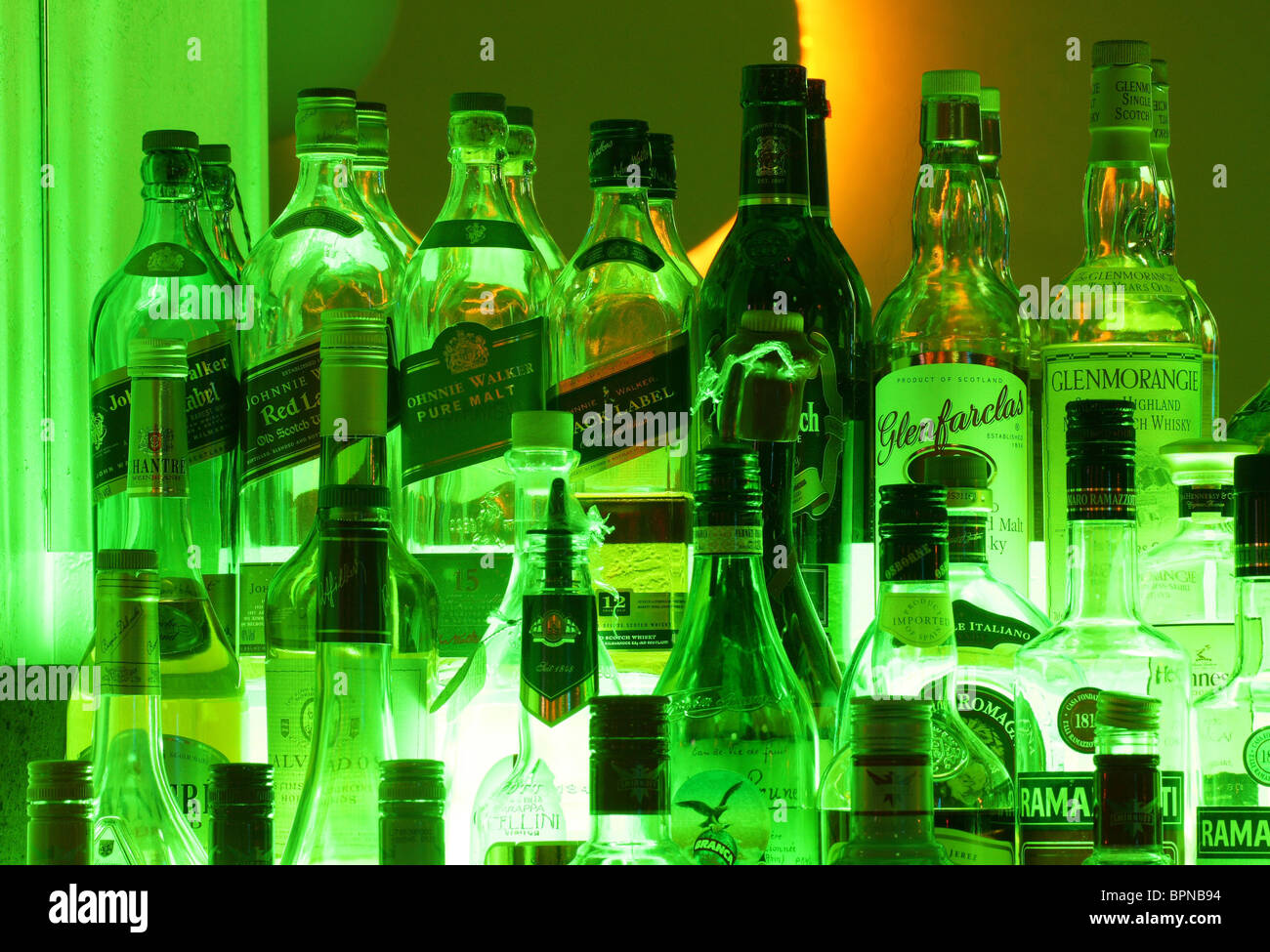 Neonilluminated liquor in a cocktail bar Stock Photo Alamy