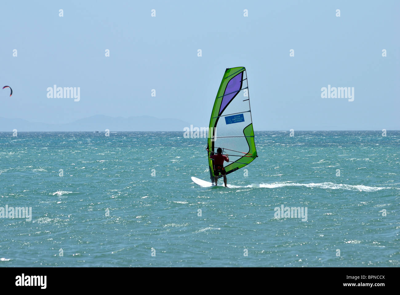 Wind surfer ejoying excellent surf condition in Playa el Yaque, Margarita Island, Venezuela Stock Photo