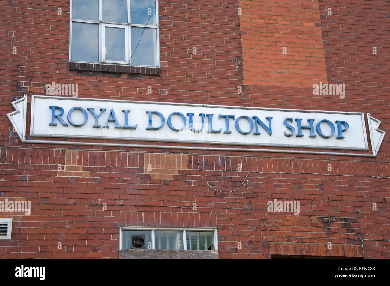 Royal Doulton shop sign on side of derelict building Burslem, Stokeon