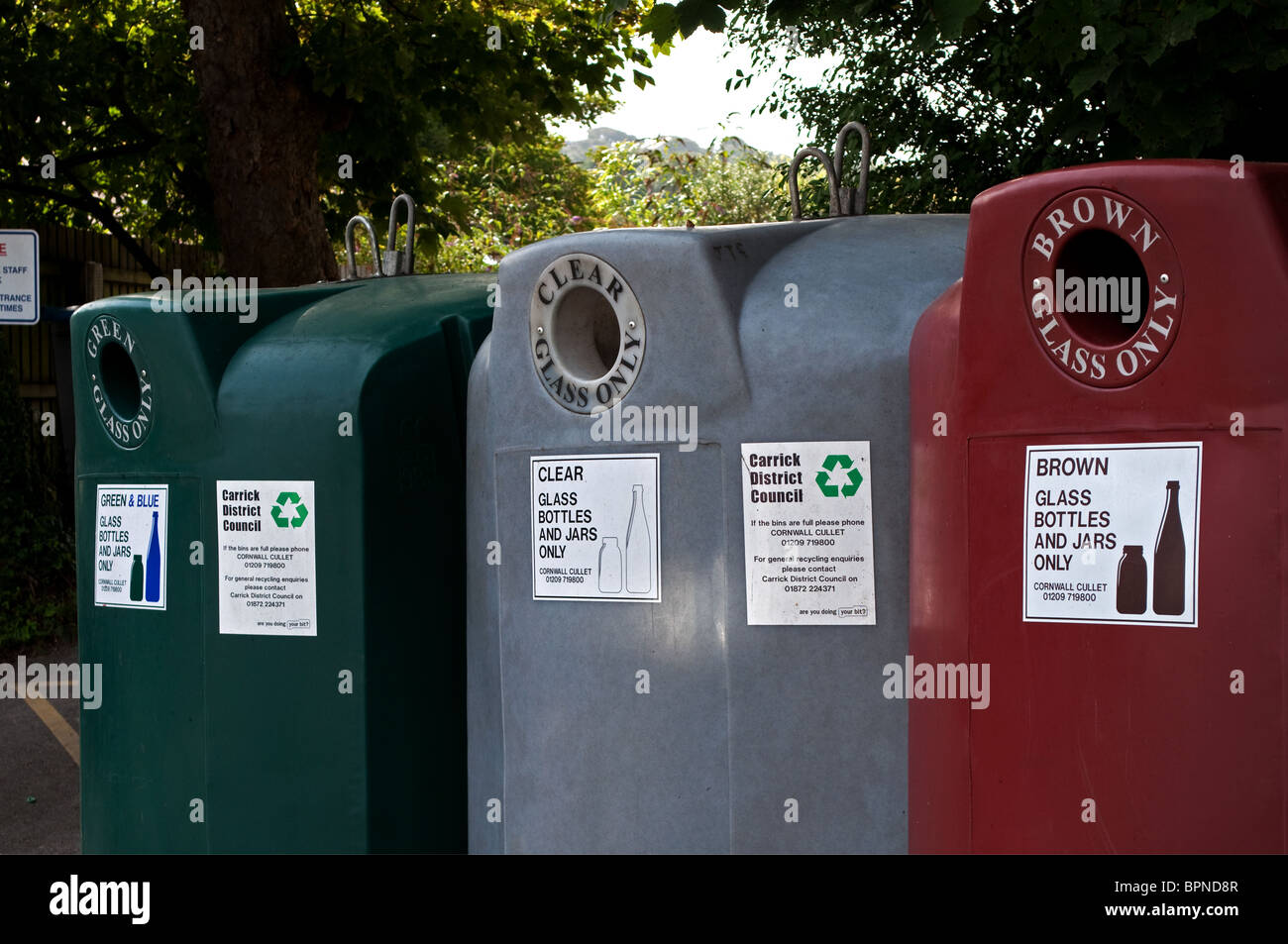 a bottle bank for recycling used bottles in a village in cornwall, uk