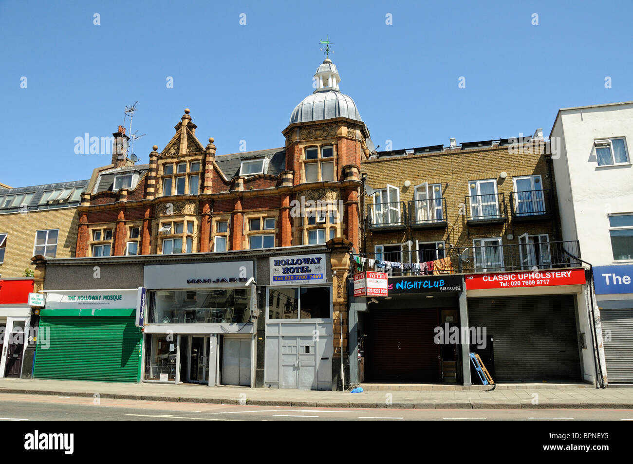Shuttered shops on Holloway Road Islington London England UK Stock Photo