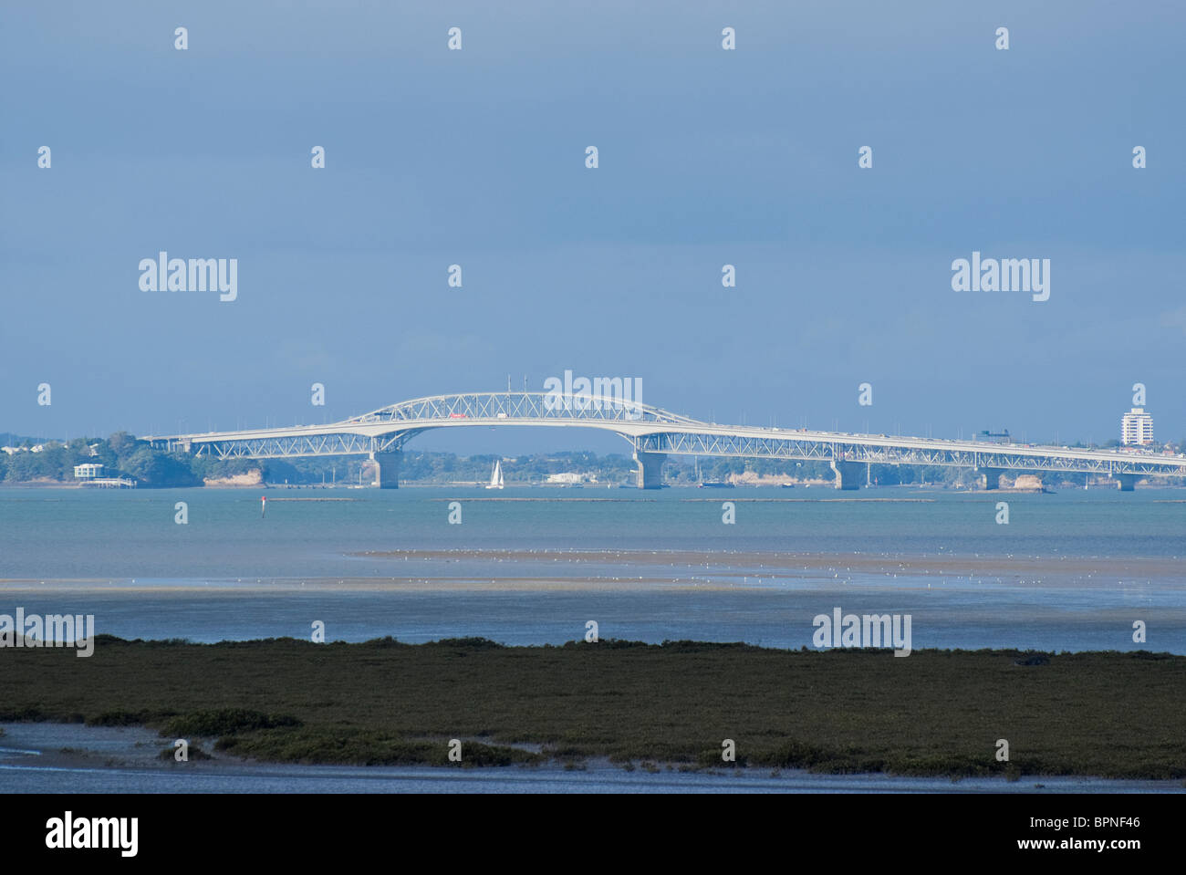 Auckland harbour bridge, seen from West Auckland. Stock Photo