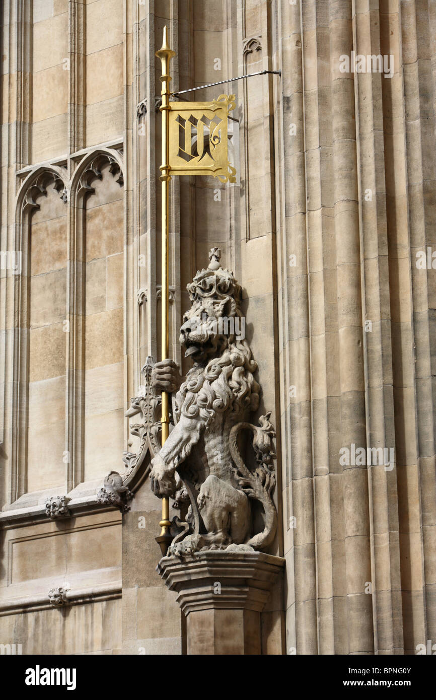 Sculpture of a heraldic lion emblem on the Houses of Parliament, Westminster, London, SW1. Stock Photo