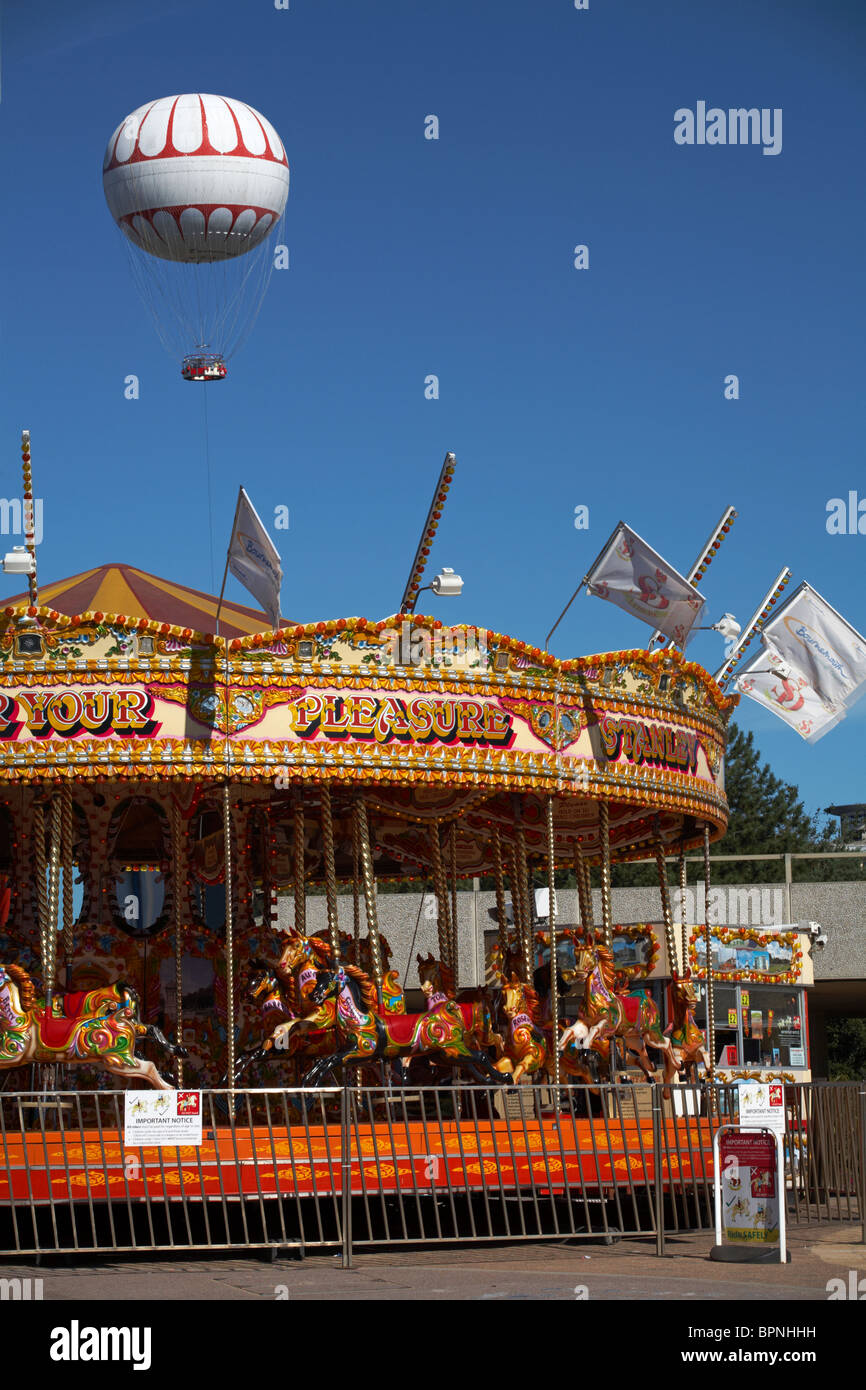 Bournemouth Balloon soaring high above the carousel on the sea front Stock Photo Alamy