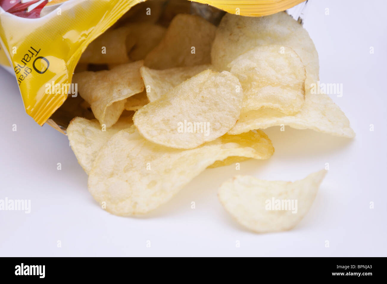 Junk food - potato chips Stock Photo