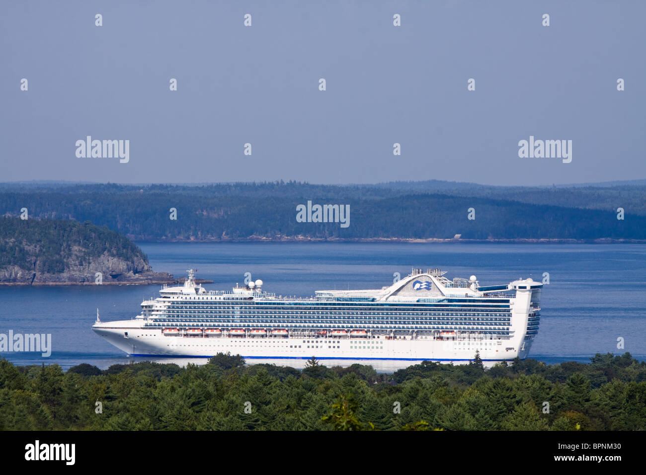 Caribbean Princess operated by Carnival Corporation is anchored in Frenchman Bay, Acadia National Park, Maine Stock Photo