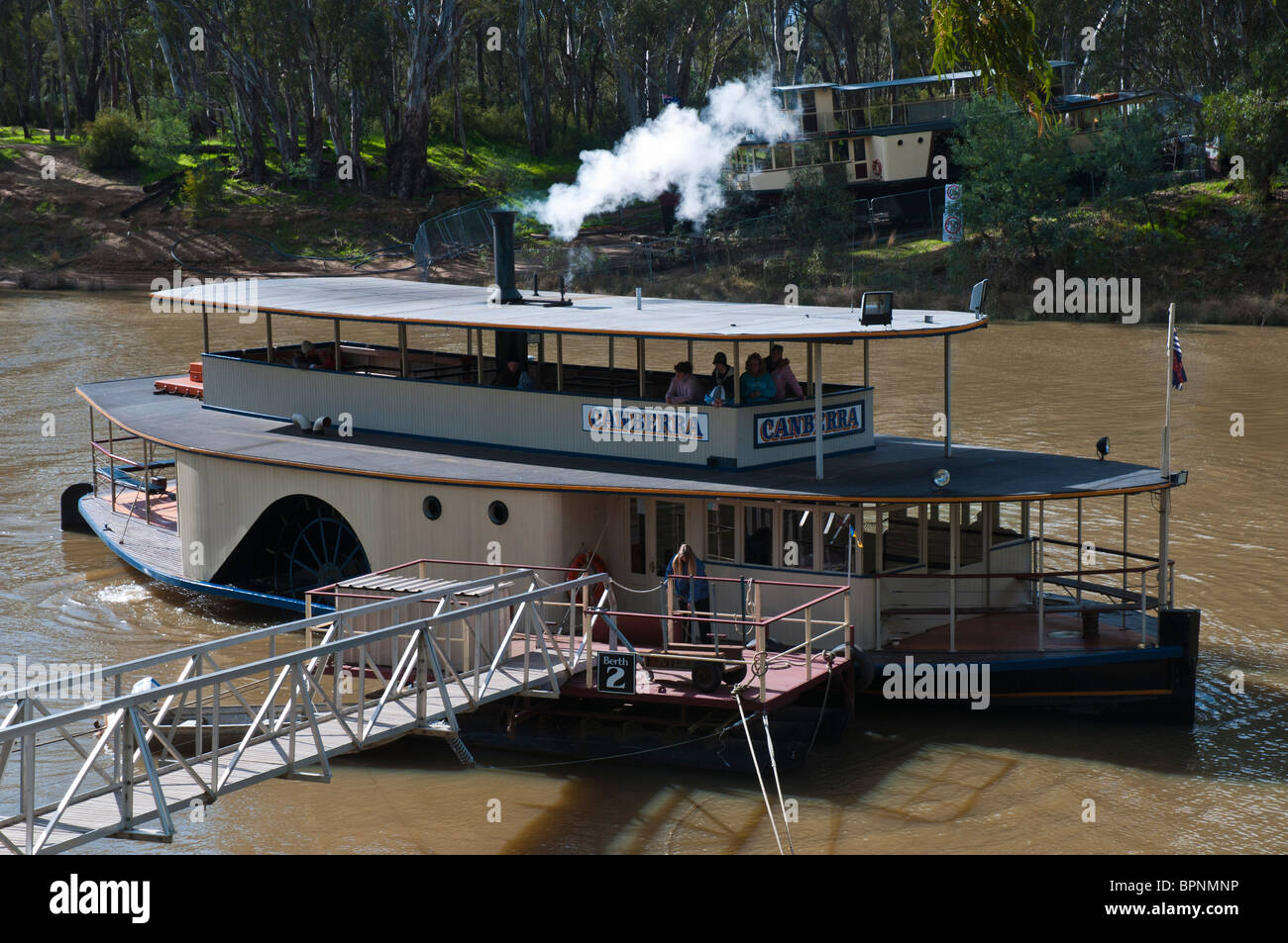 Side wheel paddle steamer 'Canberra' on the Murray River at the old port of Echuca in Victoria  Stock Photo