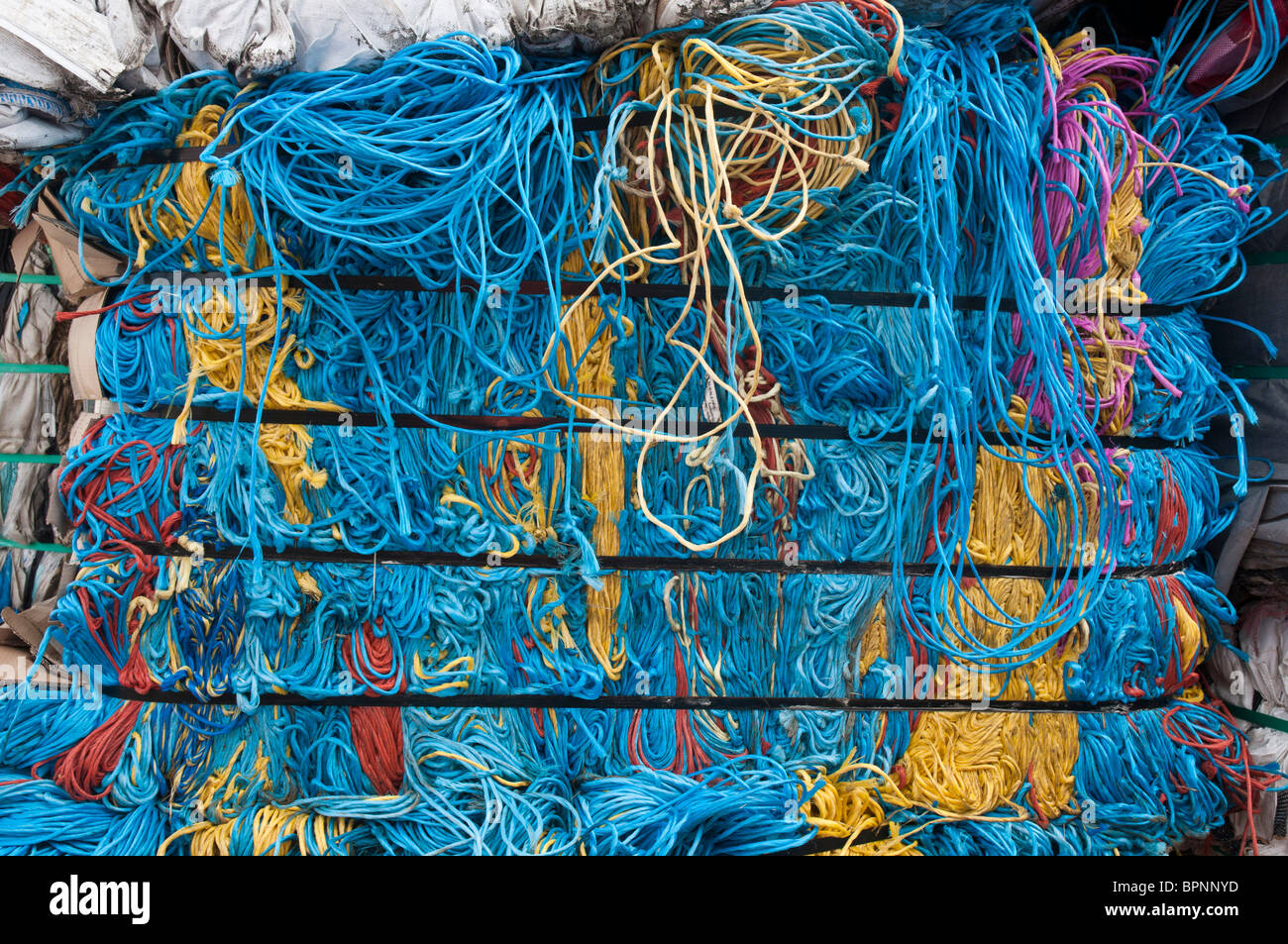 A bale of polypropylene baling twine for recycling at a recycling plant