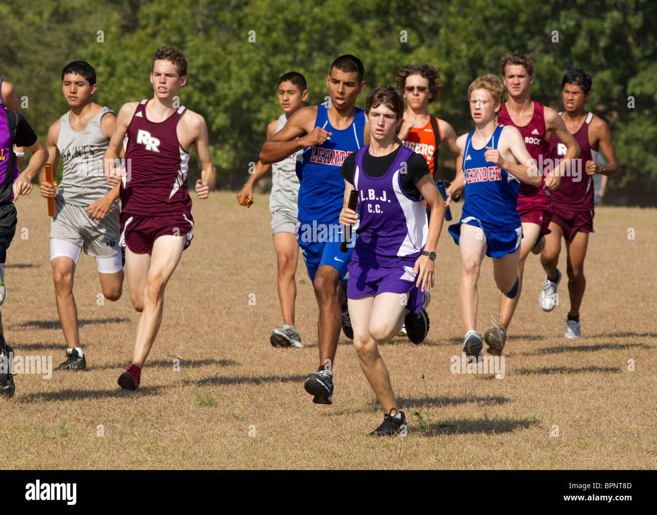 Pflugerville Texas USA, August 27 2010: Athletes from different high schools compete at a high school cross country meet at city park. ©Bob Daemmrich Stock Photo