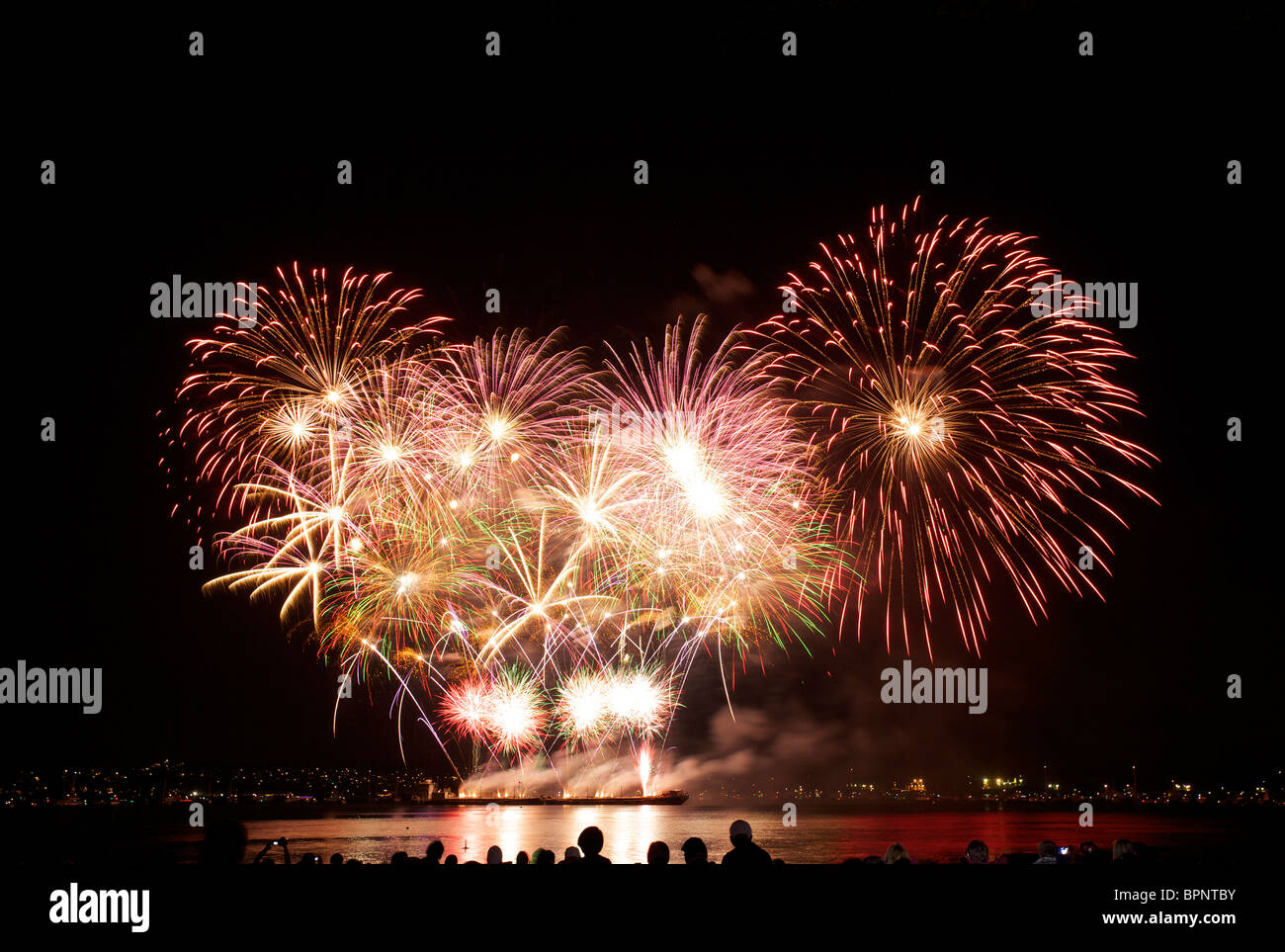Beautiful fireworks above English Bay during the Celebration of Lights 2010, Mexico night, Vancouver, British Columbia, Canada Stock Photo