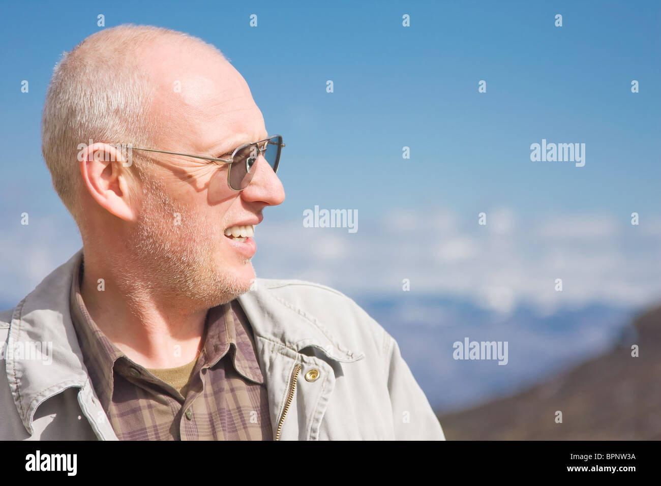 Mature man exploring the nature in spring. Stock Photo