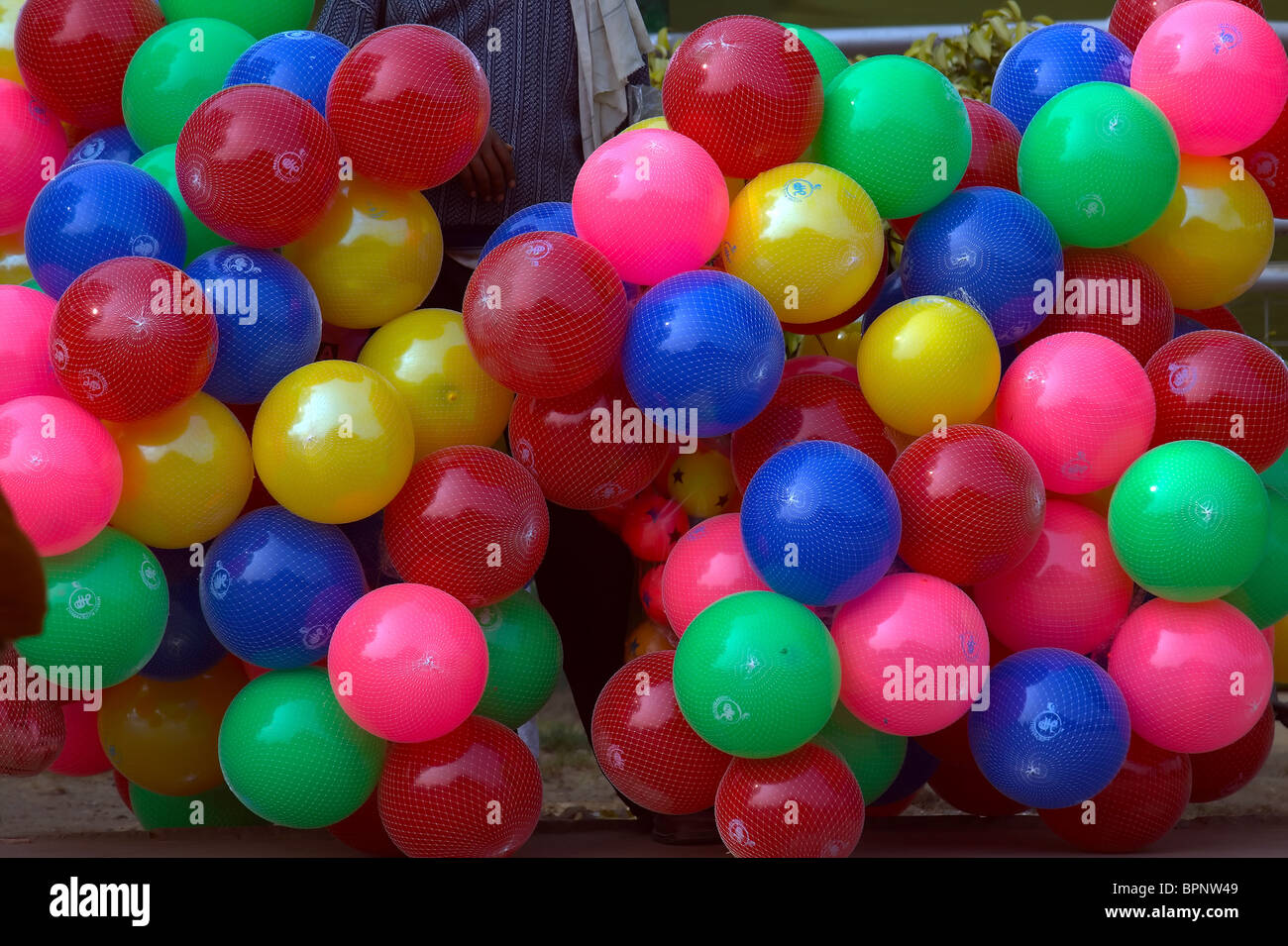 Colorful balloons and plastic ware on sale Stock Photo Alamy