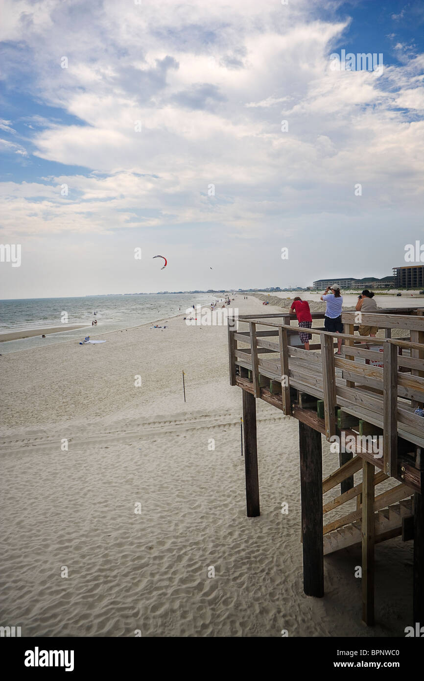 Clean but almost empty beaches with oil rigs on the horizon on Dauphin