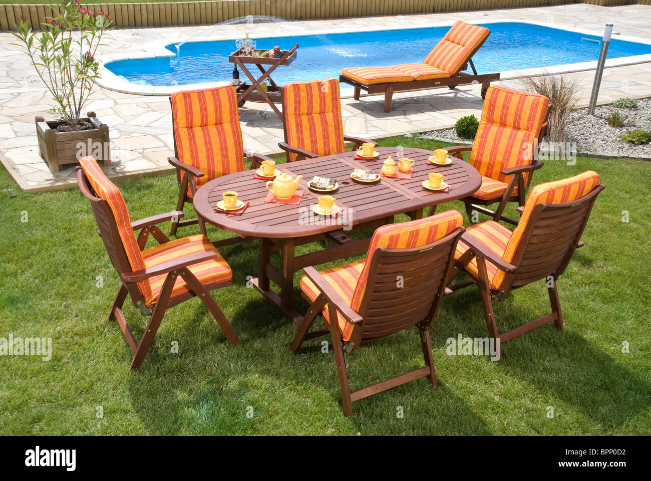 The Garden furniture by the pool Stock Photo - Alamy
