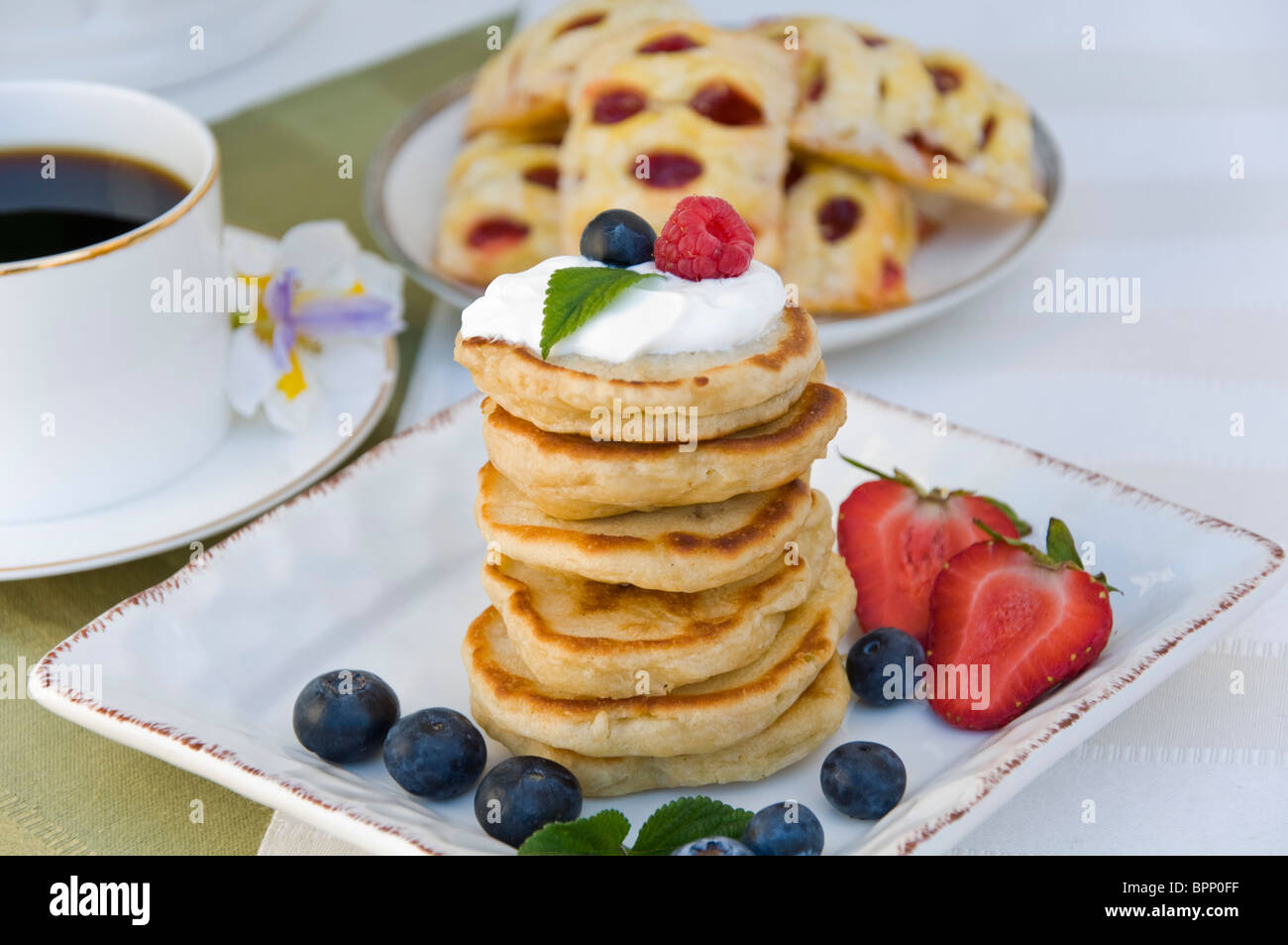 Pancakes with blueberries and raspberries Stock Photo - Alamy