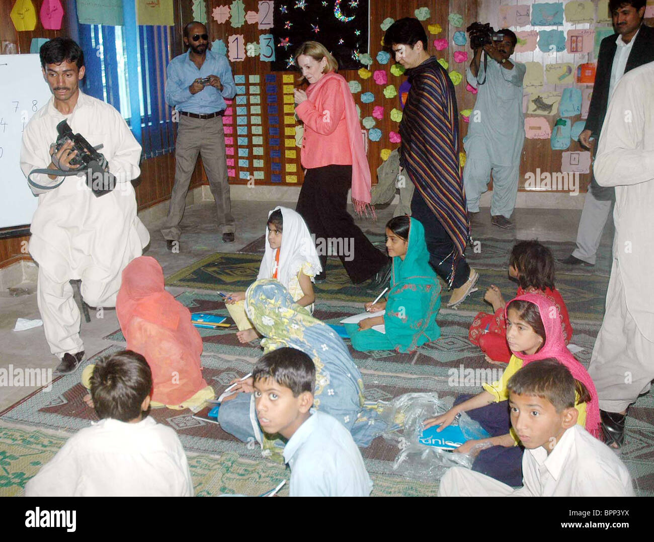 US Ambassador, Anne W.Partterson visits classroom at flood affectees relief camp established by boy scouts in Dera Murad Jamali Stock Photo