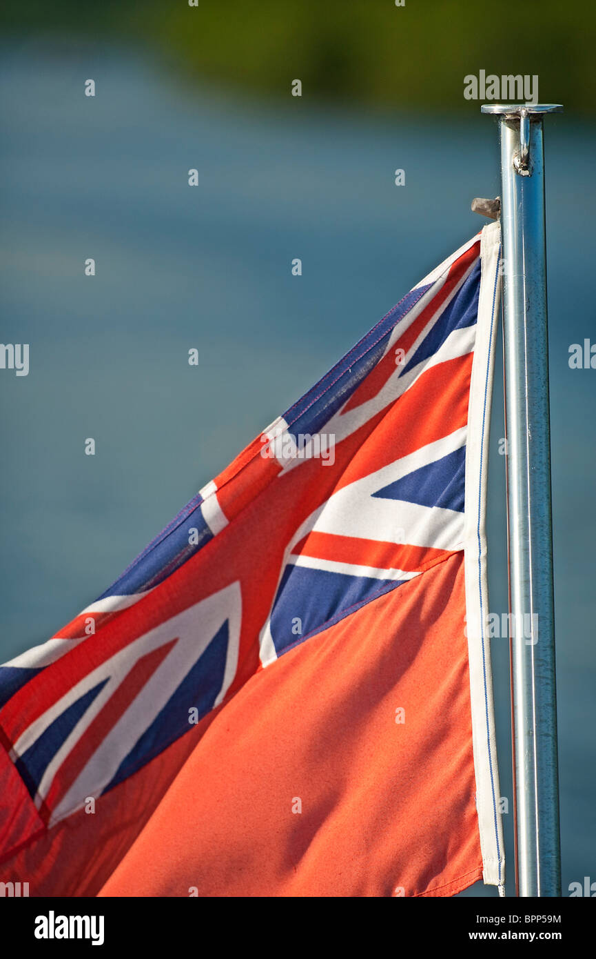 red ensign flag on stern of small boat Stock Photo Alamy