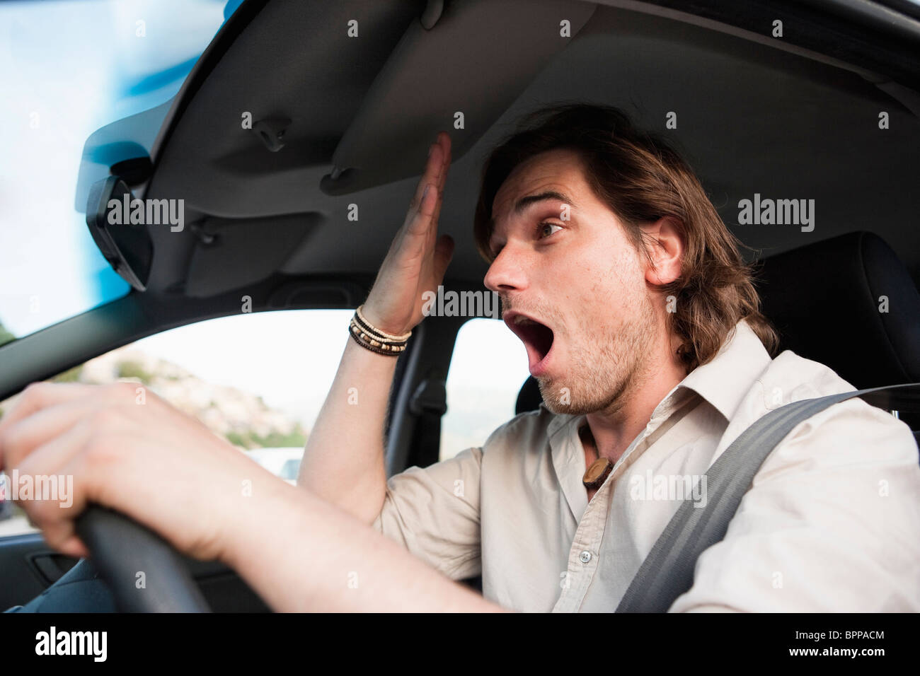 Man having stress in traffic Stock Photo