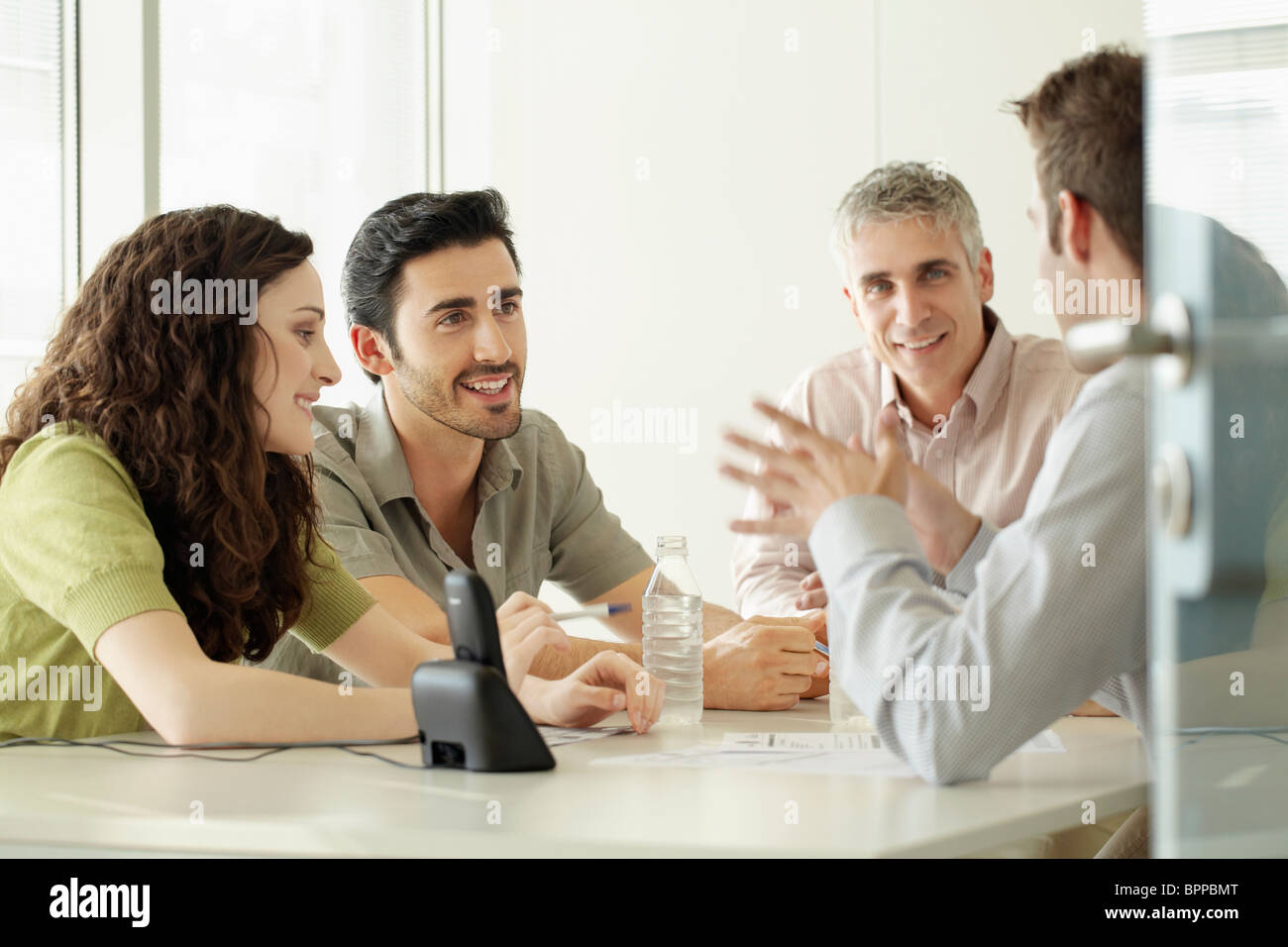 four people in discussion Stock Photo