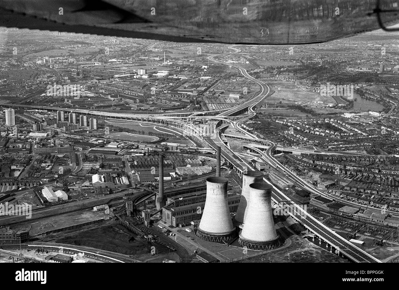 Aerial view Spaghetti Junction of M6 motorway at Birmingham under construction in 1972.M6 motorway motorways intersection aerial view elevated section road highway Britain Uk cooling towers power station Stock Photo