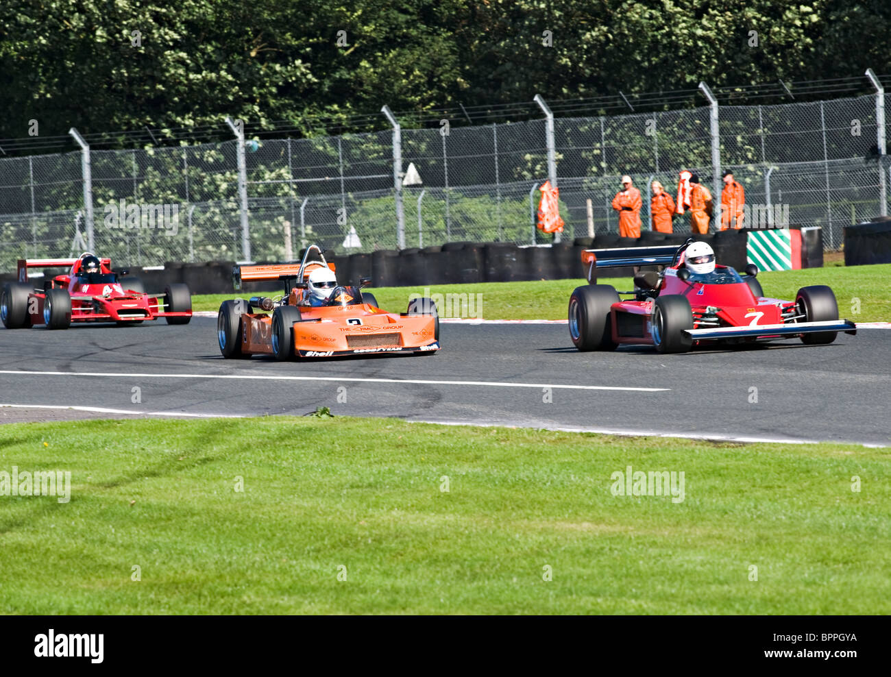 Historic Racing Cars on The Avenue at Oulton Park Motor Racing Circuit Cheshire England United Kingdom UK Stock Photo