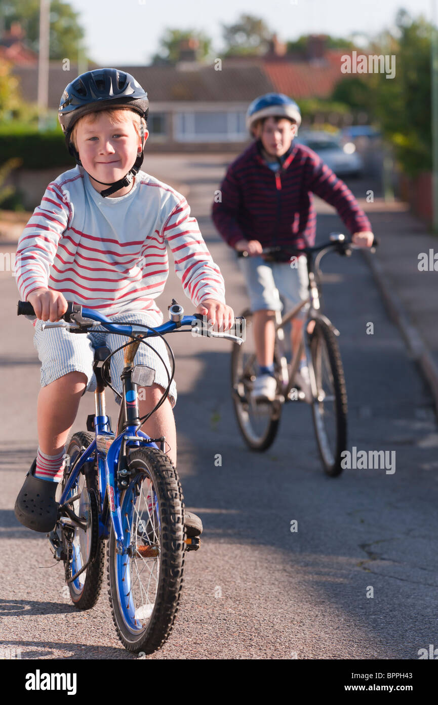 Two boys riding bikes in hires stock photography and images Alamy