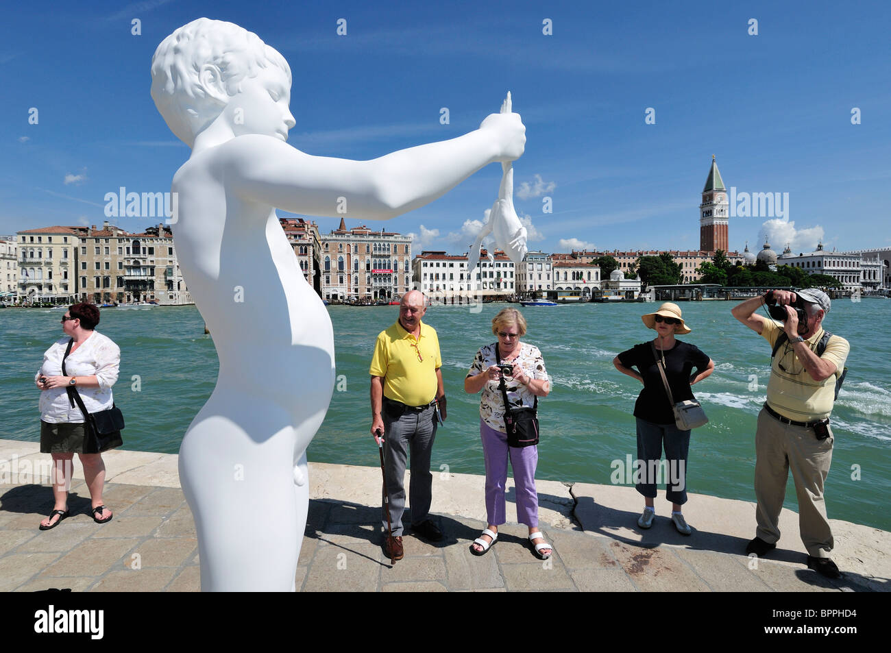 Venice. Italy. Boy with a Frog by the artist Charles Ray on the Punta della Dogana Stock Photo