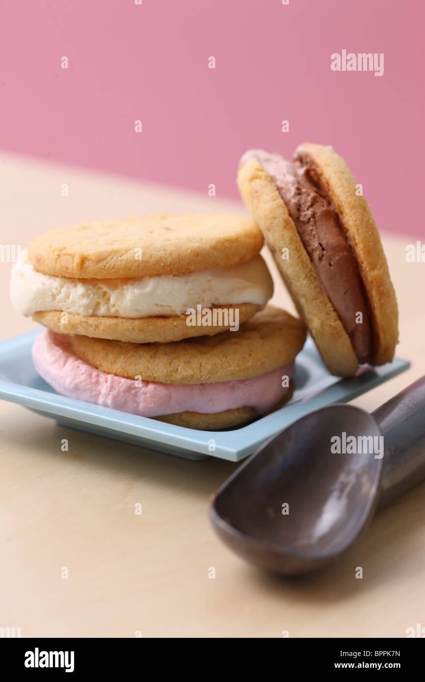 Strawberry, Vanilla and Chocolate Ice Cream Sandwiches Stock Photo