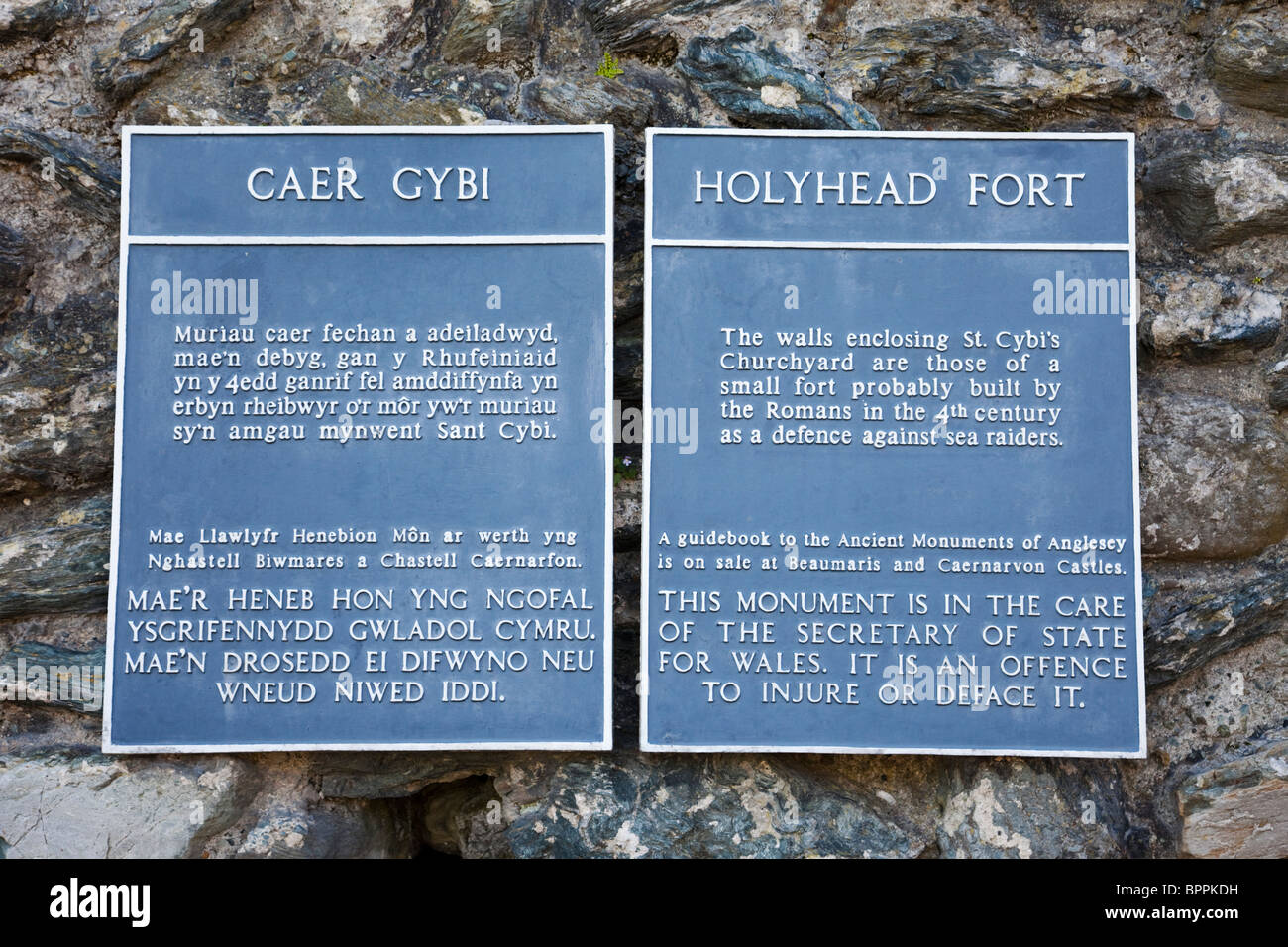 Holyhead, Isle of Anglesey, North Wales, UK. Information plaque outside Caer Gybi Roman fort walls Stock Photo