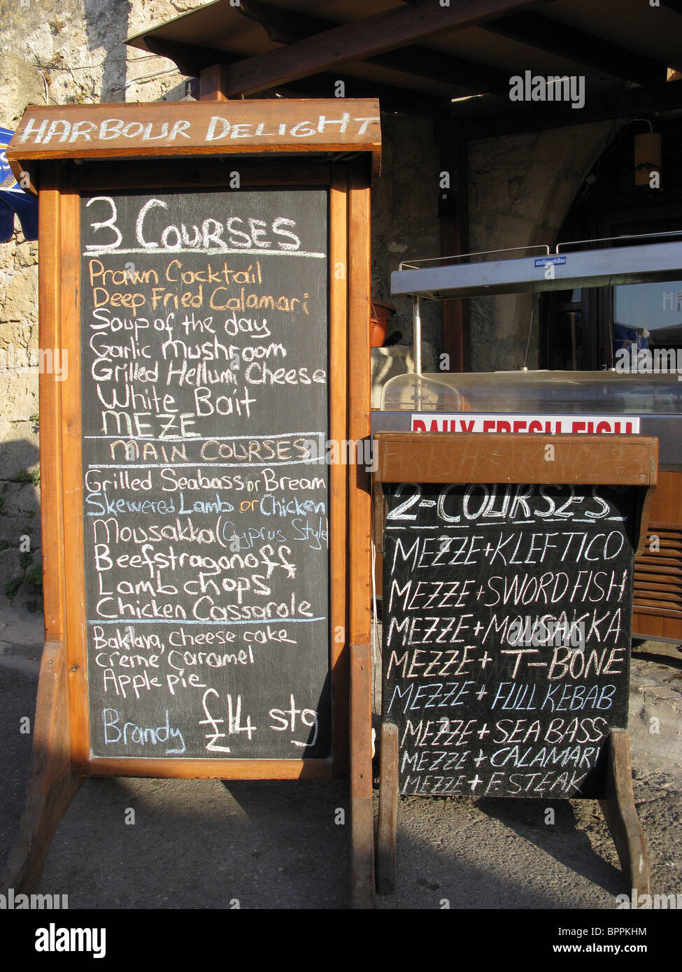 KYRENIA, NORTH CYPRUS. Menu boards outside a restaurant on Kyrenia