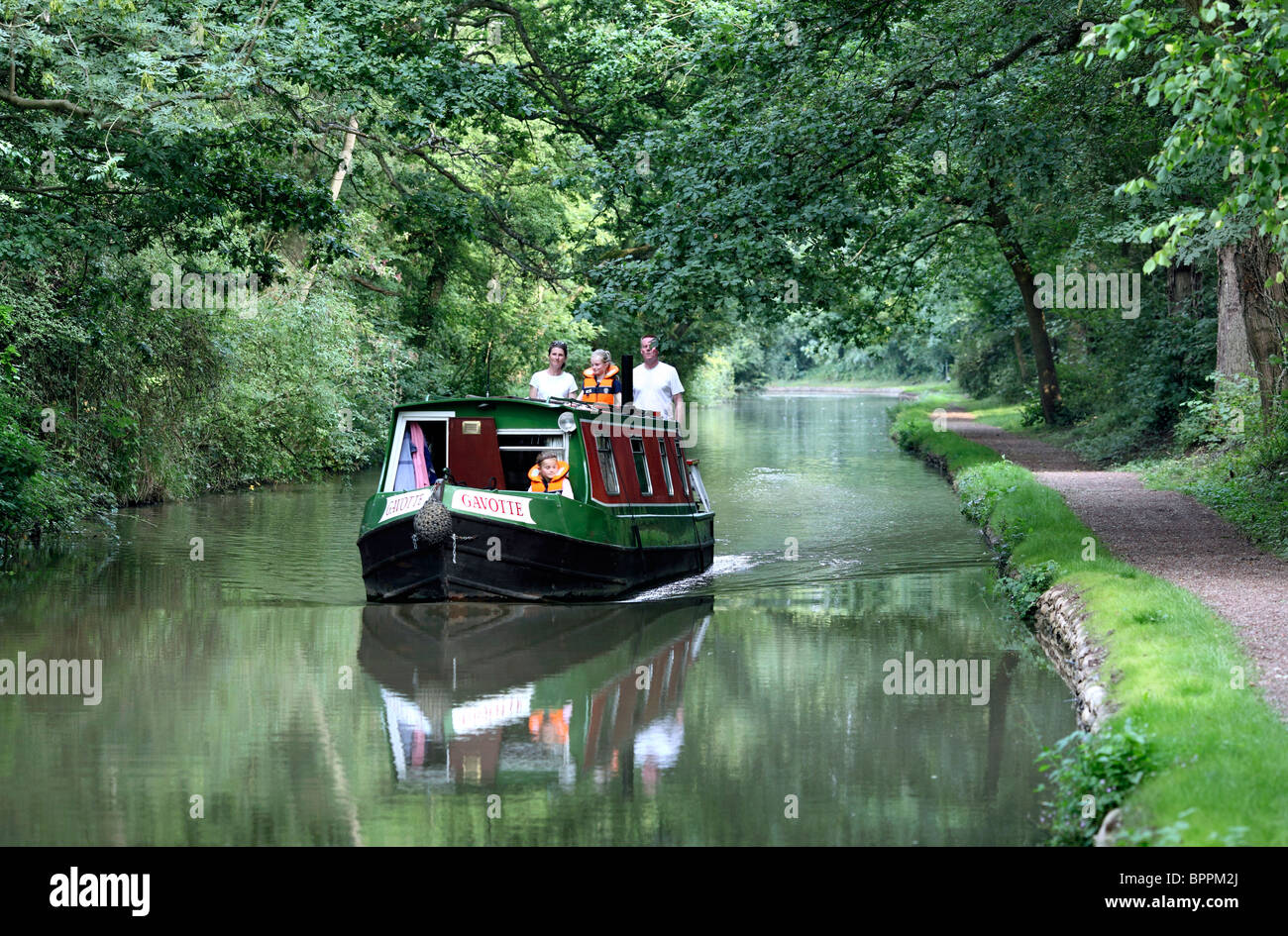 A narrowboat on the Oxford Canal near Brinklow, Warwickshire. Stock Photo