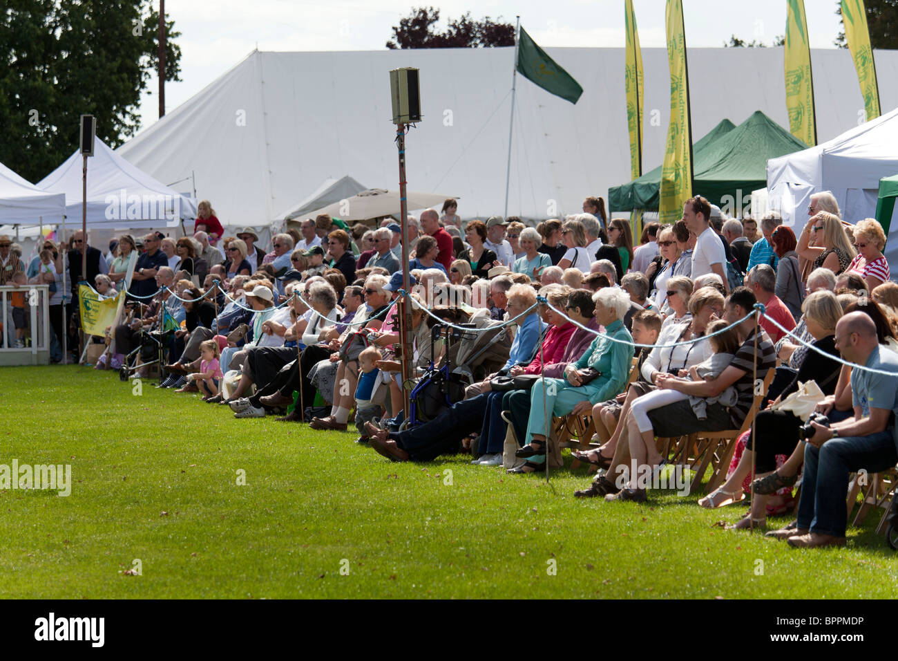 crowd of people watching arena events at Emsworth Flower Show Stock Photo