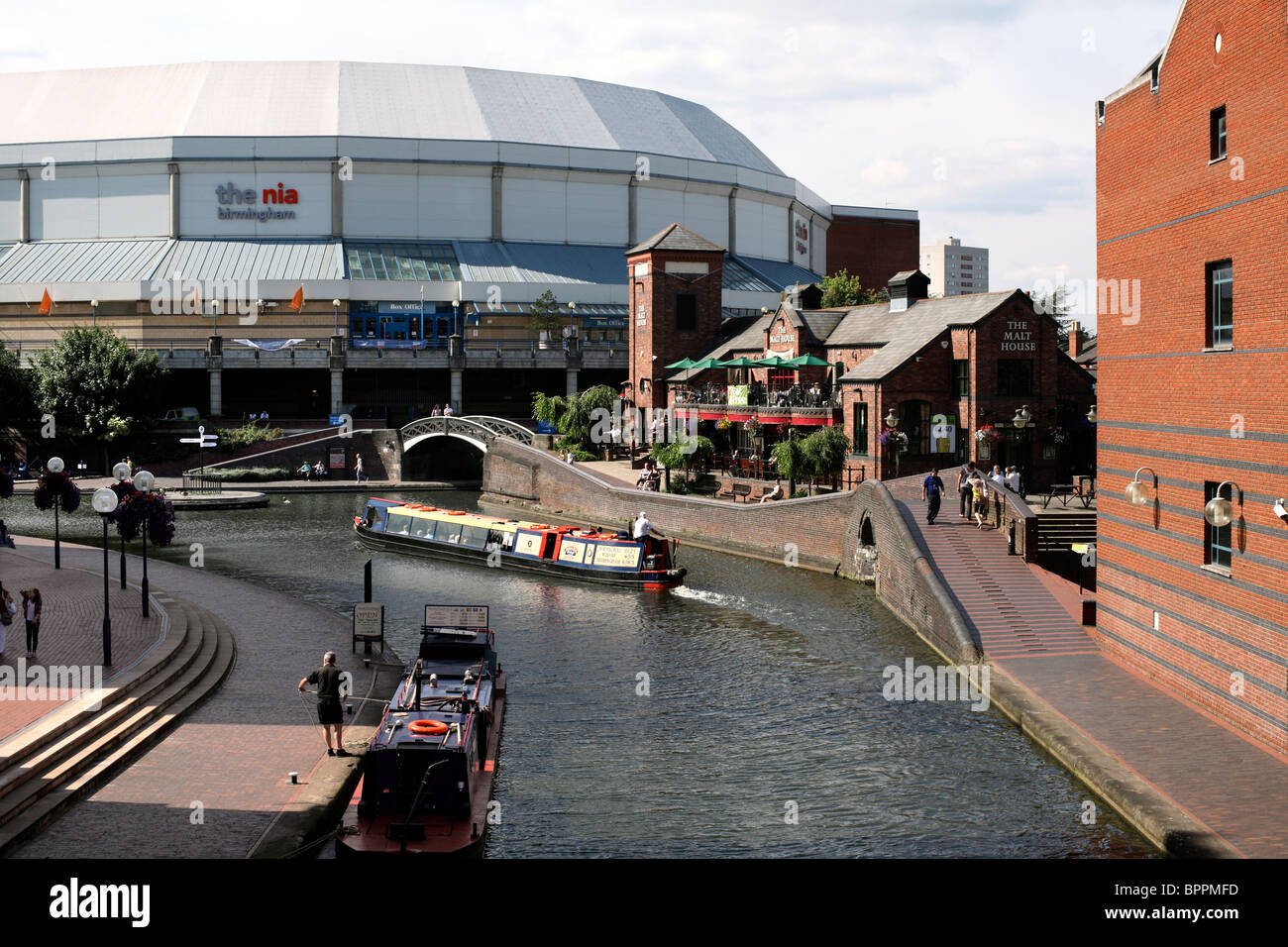 Part of the Birmingham canal network and the National Indoor Arena (NIA), Birmingham. Stock Photo