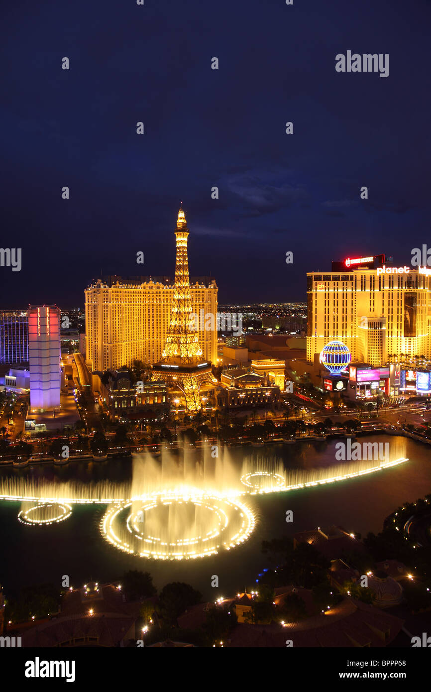 View of the Bellagio fountain and Paris hotel at night, Las Vegas Stock Photo
