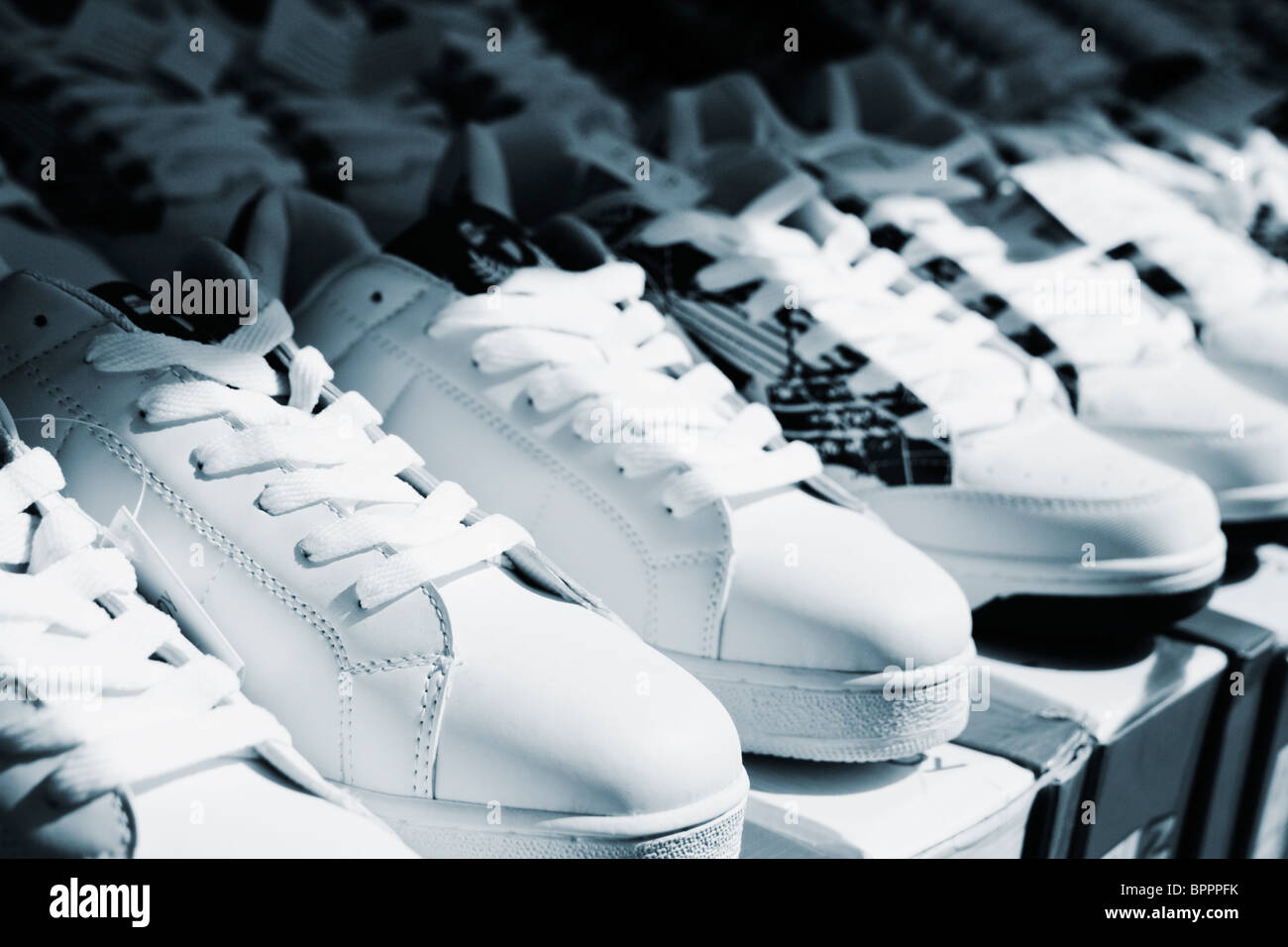 Shoes trainers market stall hi-res stock photography and images - Alamy