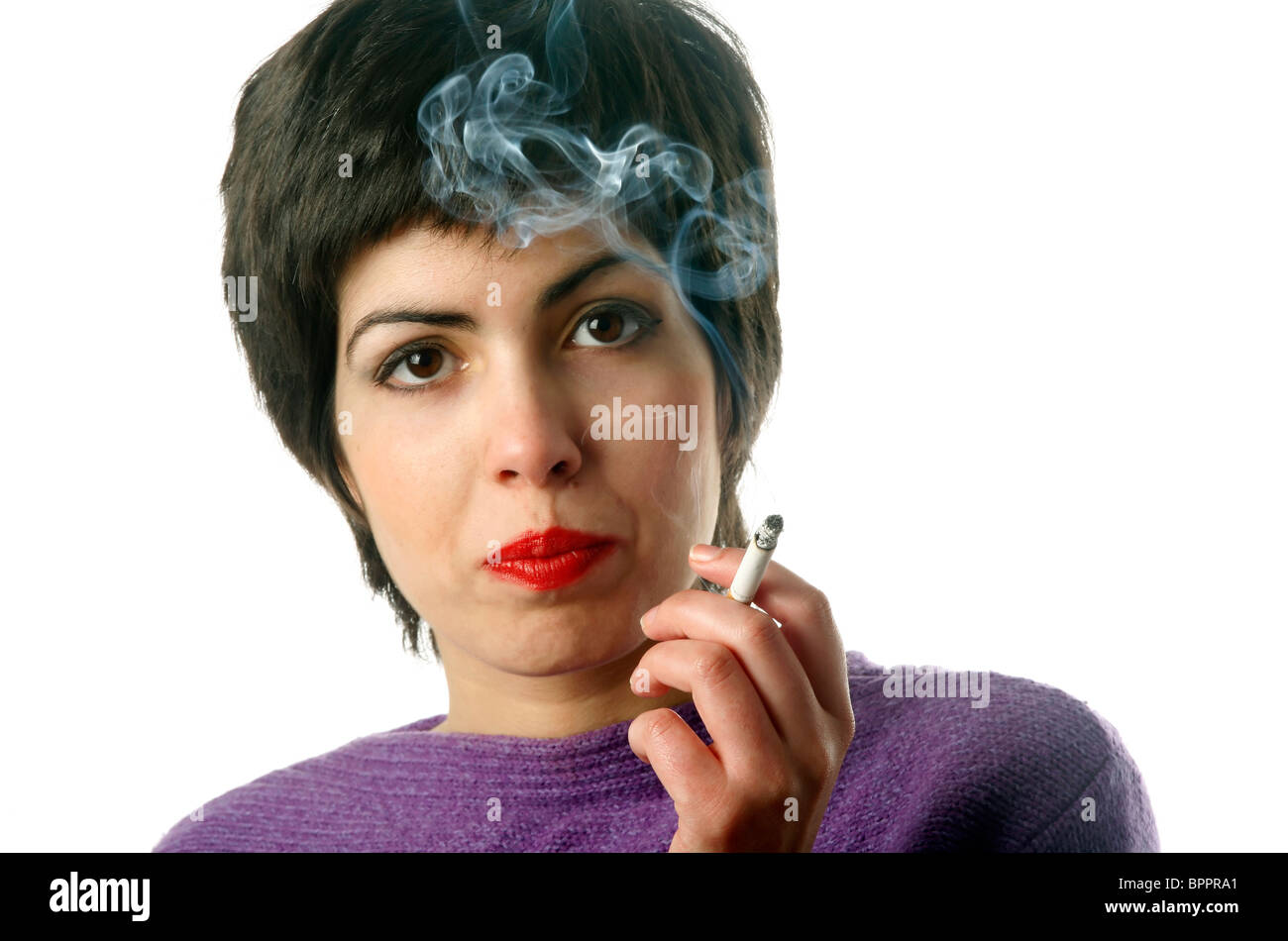 A woman smoking Stock Photo