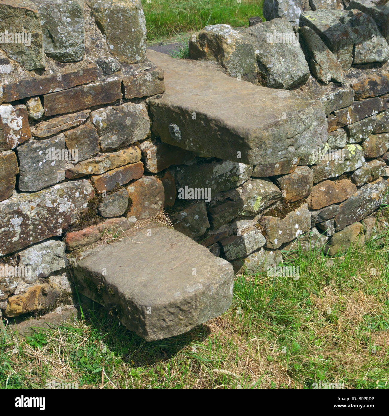 Stone Stile incorporated into a Dry Stone Wall Stock Photo