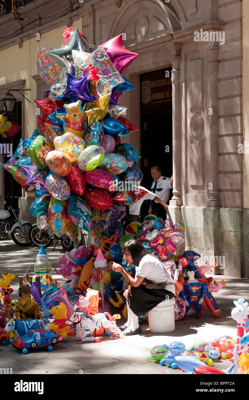 Balloons for sale on the Zocalo, Oaxaca, Mexico Stock Photo