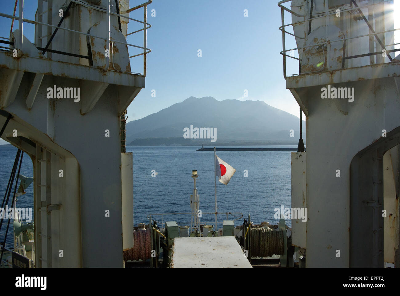 Active Volcano Sakurajima, Kagoshima, Japan taken off the ferry to Yakushima while still inside the harbour Stock Photo