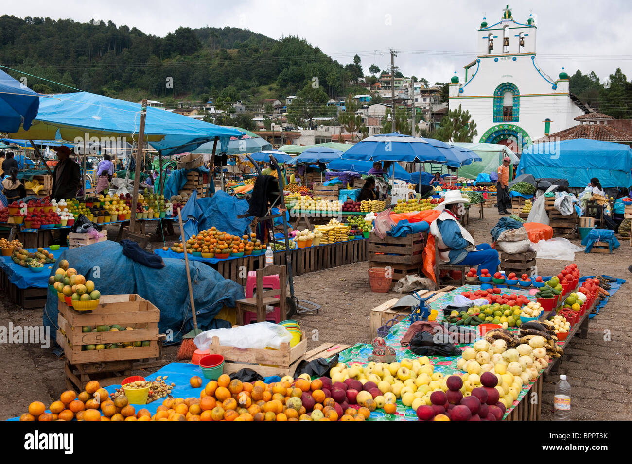 market in front of Iglesia de San Juan Bautista which practises Mayan beliefs, San Juan Chamula, near San Cristobal de las Casas Stock Photo