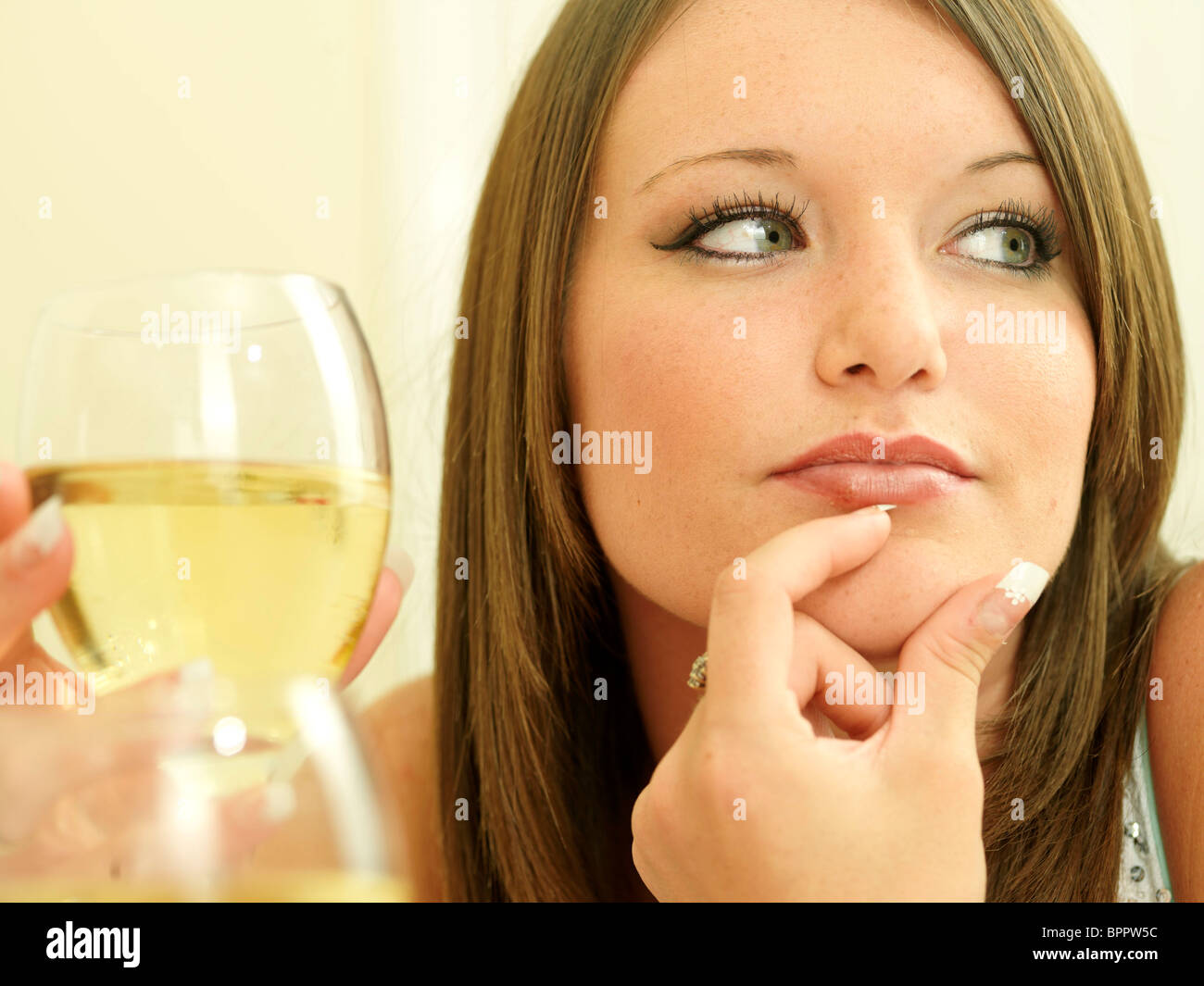 Young Women Drinking Wine. Models Released Stock Photo