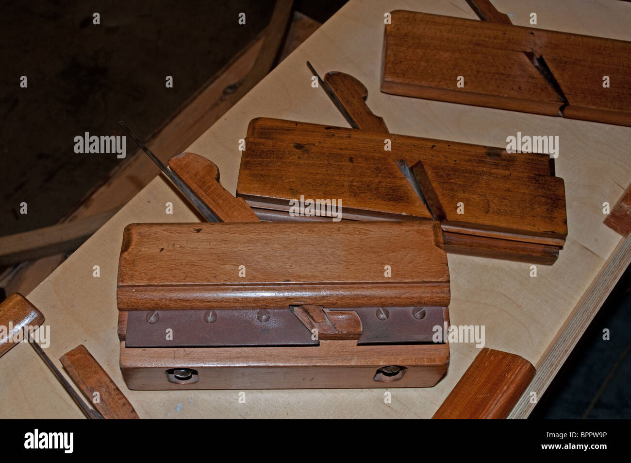 old wood working tools used by ship builders, now an exhibit at the
