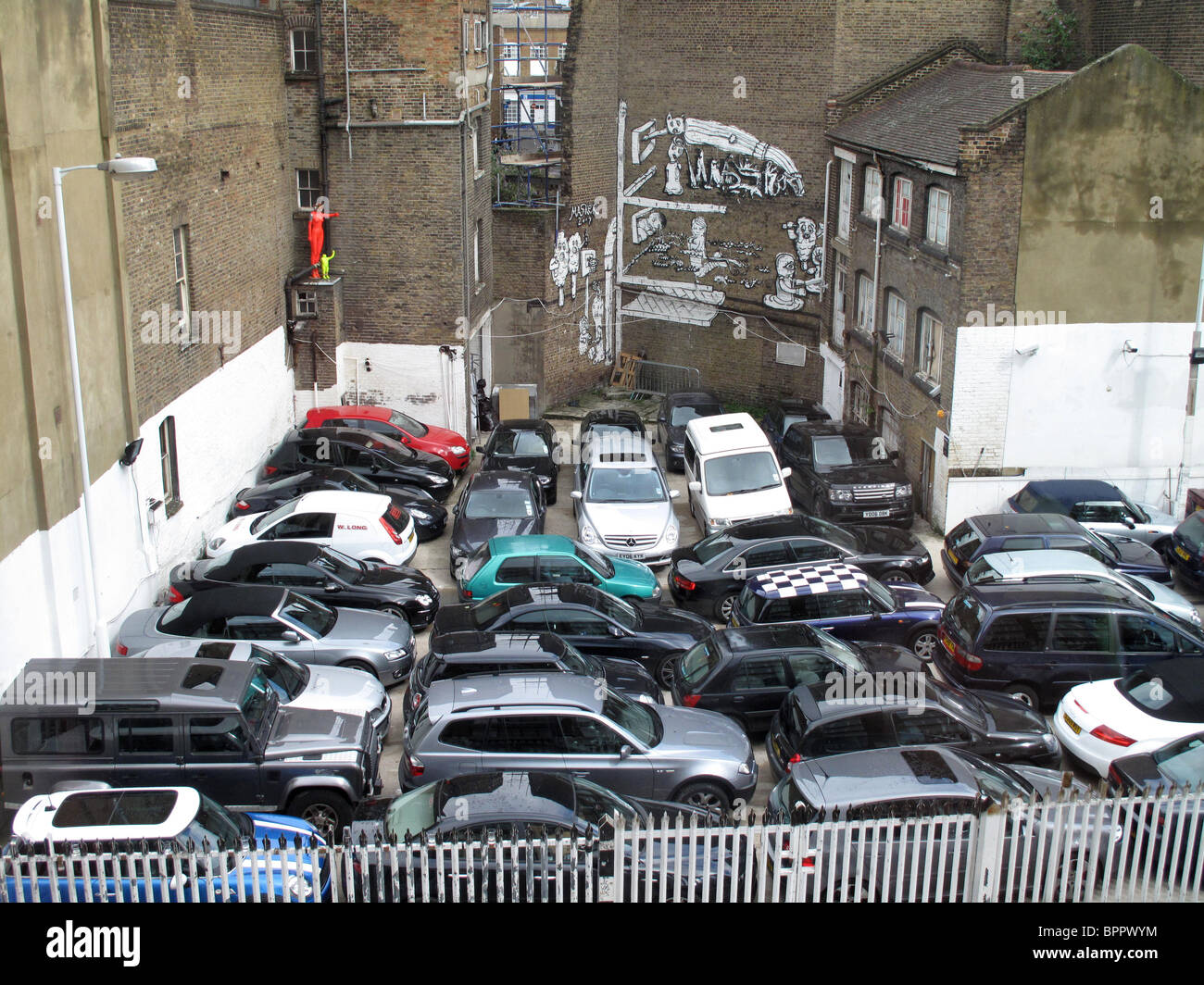 London car park. Maximising space by parking cars close together Stock Photo